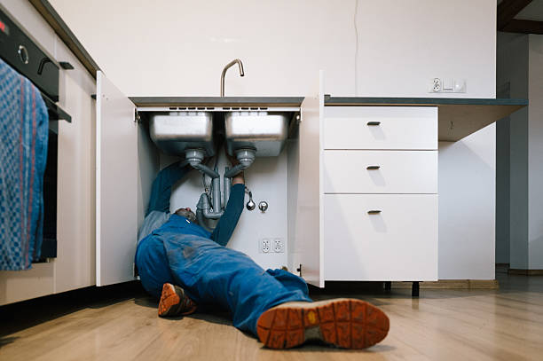Professional Emergency Plumber technician working in West Newton, PA